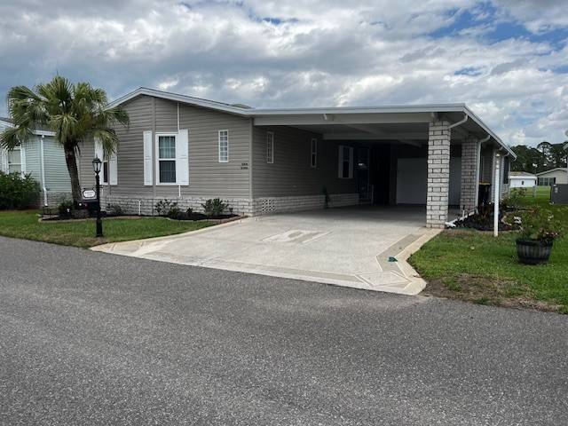 Winter Haven, FL Mobile Home for Sale located at 1098 Lacosta Lane West Four Lakes Golf & Country Club